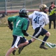 youth lacrosse defender out of position chasing