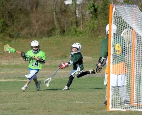 youth lacrosse righty sweep dodge into slot