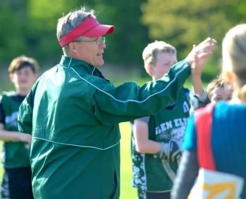 Coach Talking to Players