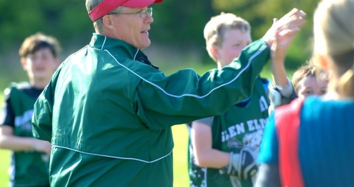 Coach Talking to Players